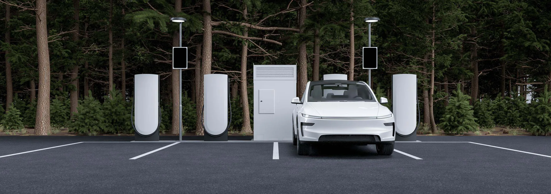 Tesla Supercharger posts, a power cabinet and lighting at a commercial parking site