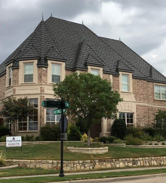 Home with dimensional shingle roof replacement