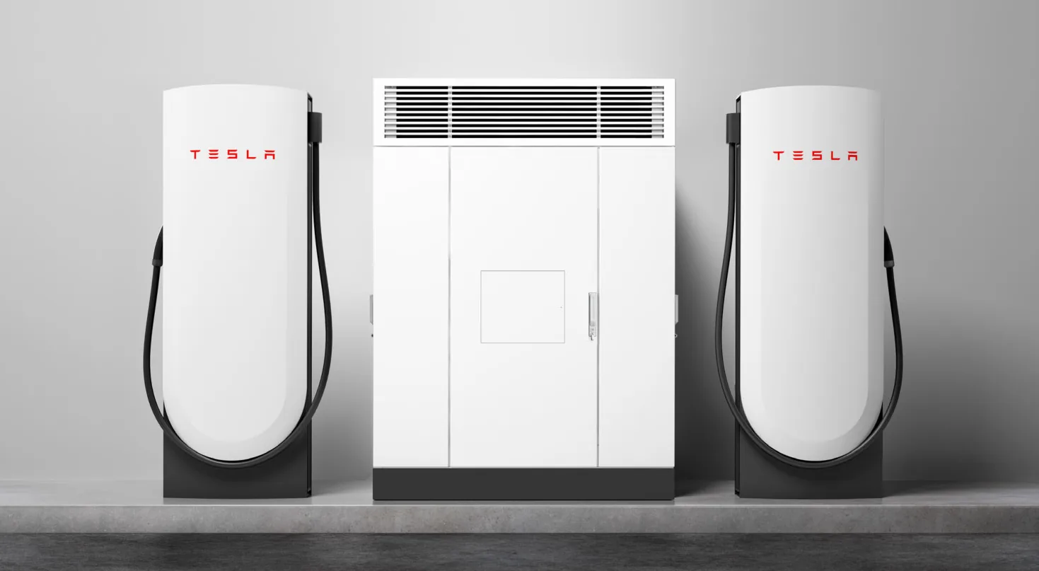 Two Tesla V4 Supercharger posts beside a V4 power cabinet