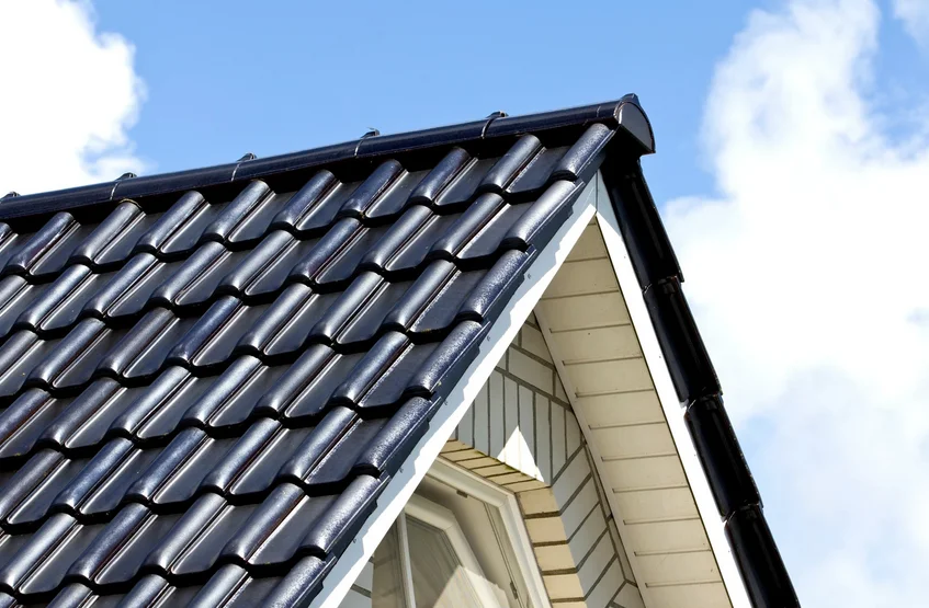 Tile roof rake edge along a home's gable