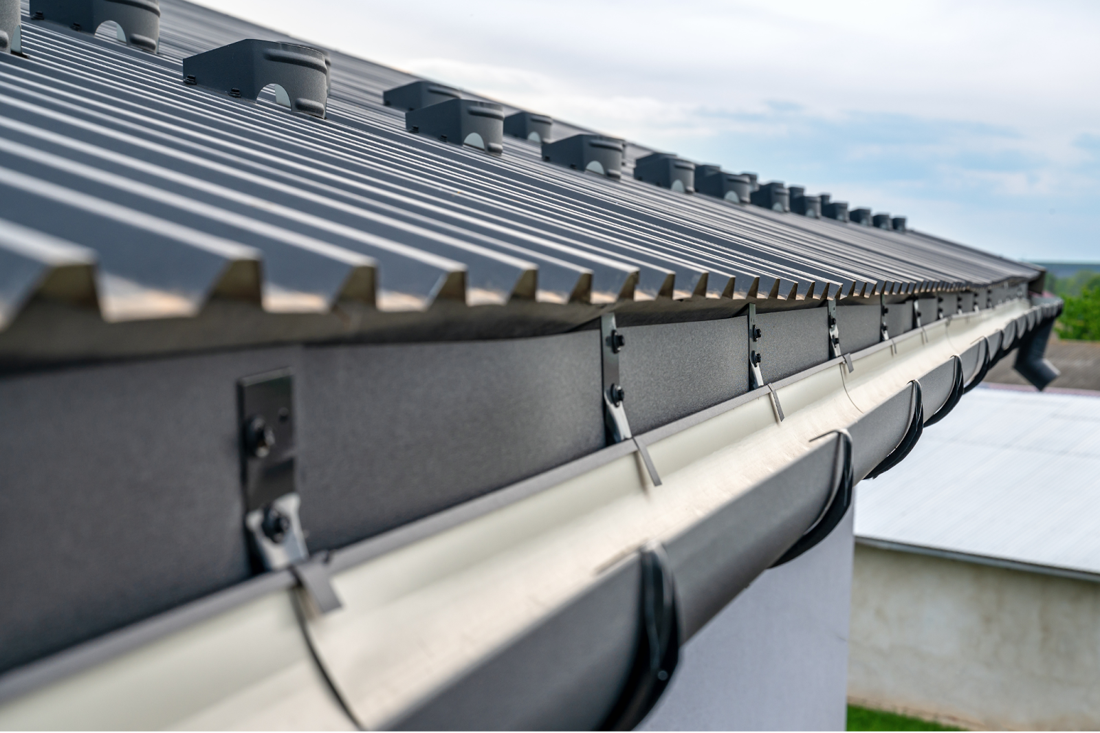 a metal roof with a gutter