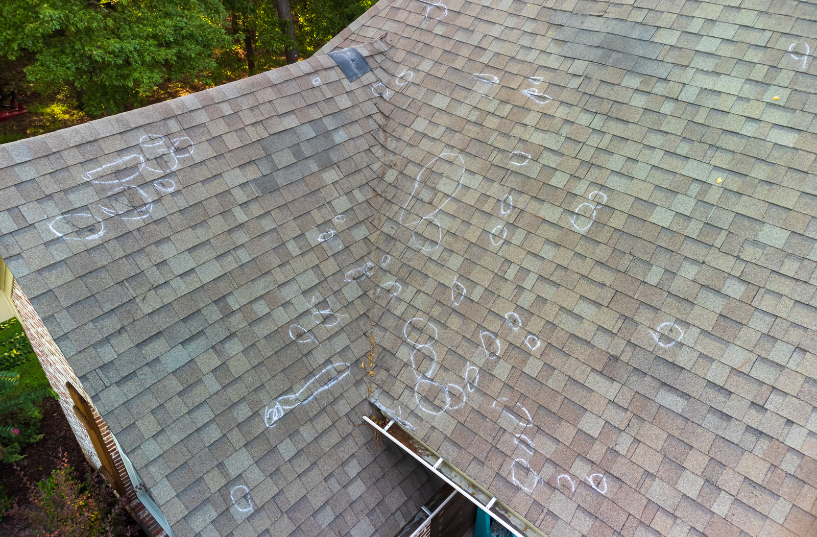 roof with markings for hail damage inspection