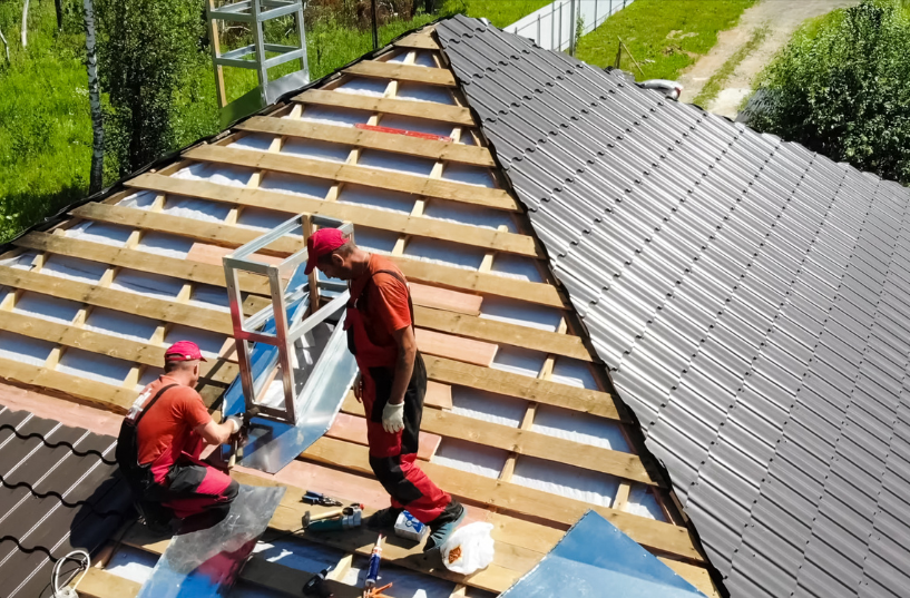 roofing company installing corrugated metal roof