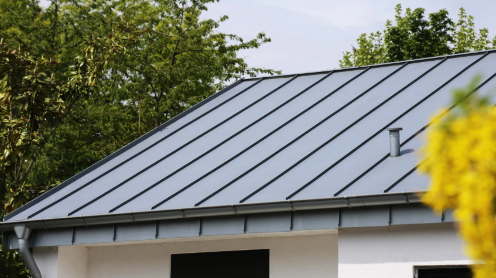 Standing Seam Roof vs. Exposed Fastener: Which One’s Worth the Cost?